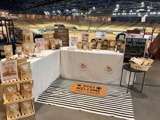 The booth set up at an indoor arena event